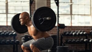 Man Lifting Weights at Gym