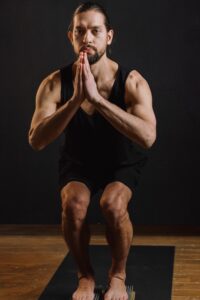 fitness man doing body weight squat