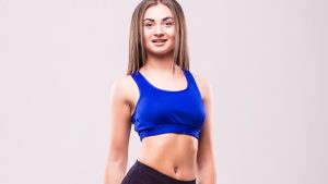 beautiful-young-sporty-muscular-woman-isolated-against-white-background.j