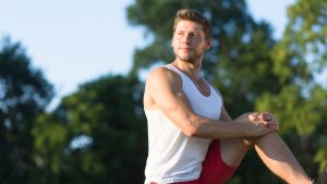 fitness-man-doing-stretching-exercises-outdoors-young-male-sportsman-stretching-preparing-run-park.jpg