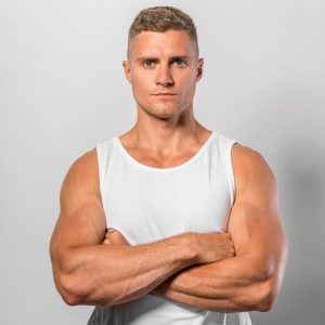 front-view-fit-man-posing-while-wearing-tank-top-with-crossed-arms.jpg