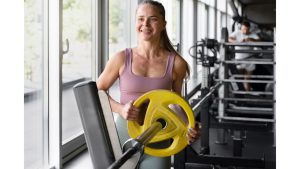 front-view-smiley-woman-gym.jp
