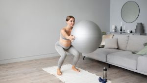 pregnant-woman-exercising-home.jpg