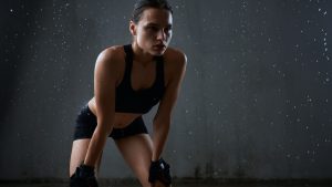 sportswoman-posing-sportswear-isolated-gray.jpg