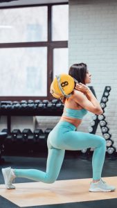 young-adult-woman-doing-strength-exercises-gym (1).j