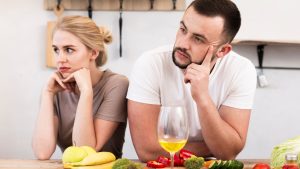 young-couple-thinking-kitchen.jpg